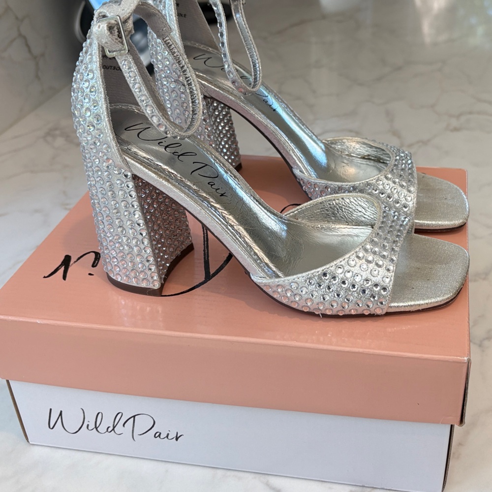 Wild Pair Shimmering Silver Heels